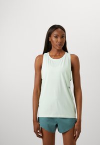 Mint green athletic tank top with a round neckline and racerback design, paired with dark teal shorts. Smooth, lightweight fabric.
