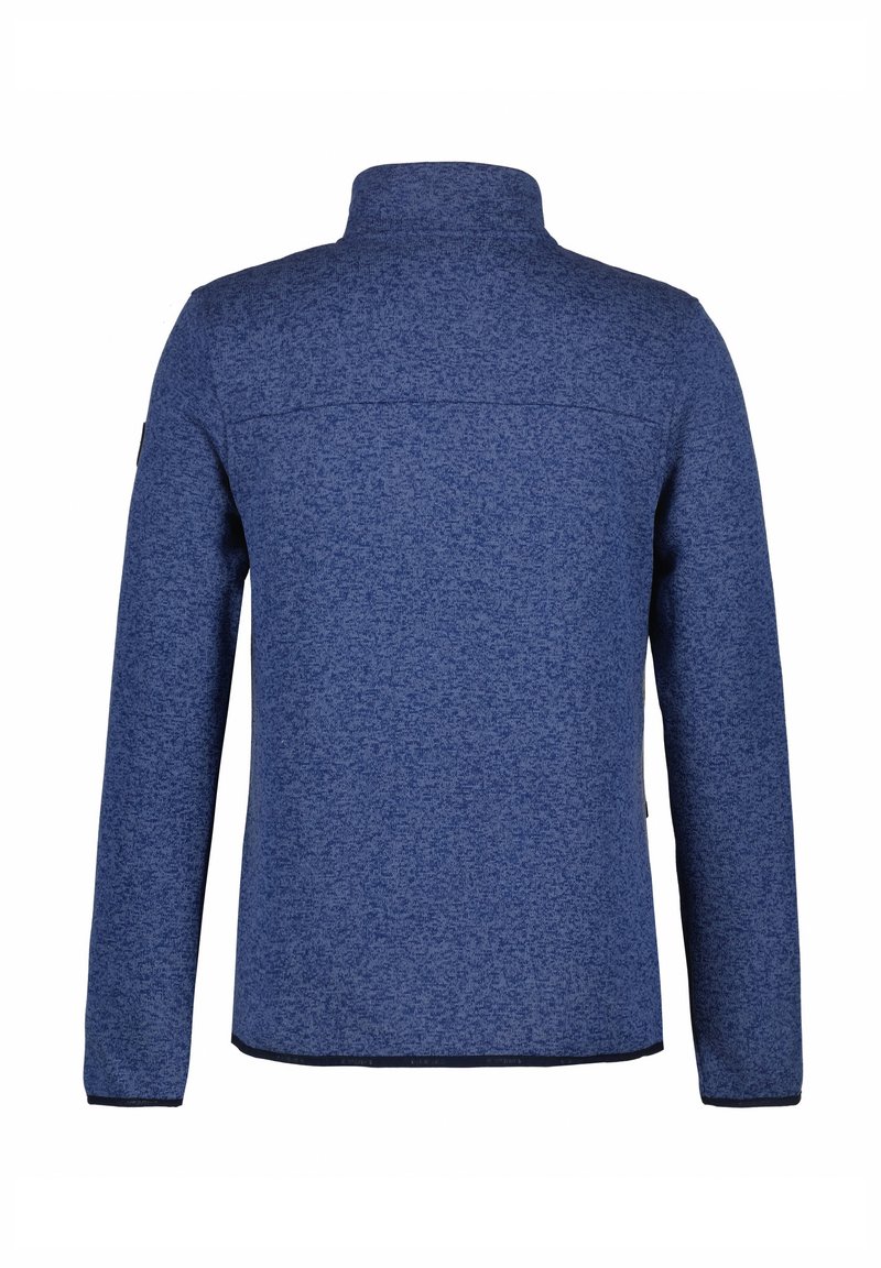 Granatowa polarowa kurtka z wysokim kołnierzem, długimi rękawami i teksturowanym materiałem. Charakteryzuje się czystym, minimalistycznym stylem bez ozdób.