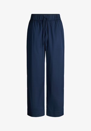 Pantalon large bleu marine avec taille élastique et cordon de serrage, doté d'ourlets retroussés et d'une coupe décontractée.