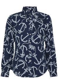 Chemise à manches longues bleu marine présentant un motif d'ancre et de corde en gris clair. Col à boutons et patte de boutonnage à l'avant avec des boutons de couleur claire.