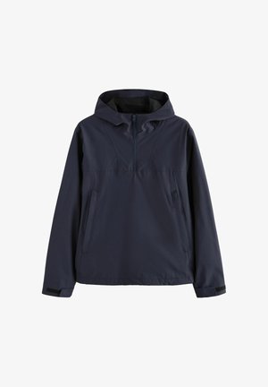 Jūras zilas krāsas jaku ar kapuci, kas ir aprīkota ar priekšējo pusi ar rāvējslēdzēju, garām piedurknēm, sānu kabatām un regulējamiem plaukstas siksniņām ar Velcro aizdariem.