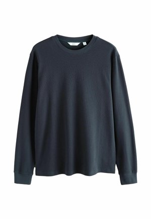 Mørkegrå langærmet t-shirt fremstillet af ribbet stof, med rund hals og afslappet pasform, samt manchetter ved ærmesluttterne.
