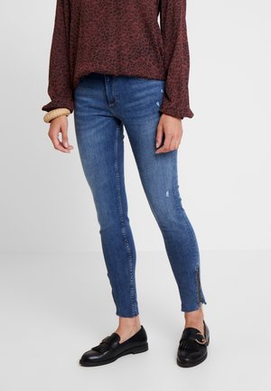 Jeansy Skinny Fit