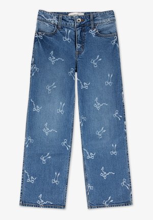 Denimjeans i mediumblå med lige ben. Har hvide sløjfemønstre, forlommer og tydelige syningsdetaljer.