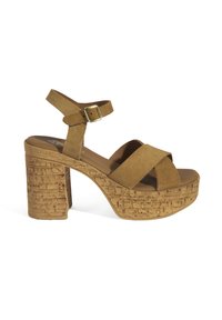 Bruine suède hoge hakken sandalen met een kurken platform, voorzien van een enkelbandje en een kruislings ontwerp op het teengebied.