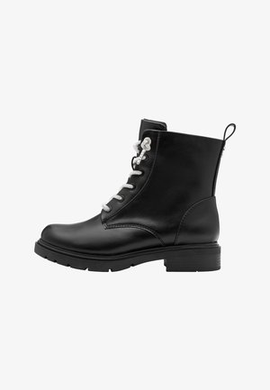 Schwarze Leder-Ankle-Boots mit silbernen Schnürsenkeln, runder Zehenpartie und einer Gummigriffsohle. Verfügt über eine Schlaufe an der Rückseite für einfaches Anziehen.