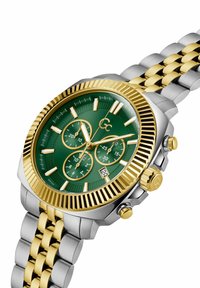 Herrenuhr mit grünem Zifferblatt, goldenen Akzenten, Edelstahlarmband, Multifunktions-Chronograph und Datumsanzeige bei 6 Uhr.