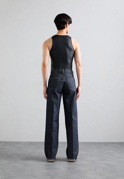Helmut Lang CARPENTER - Avar lõikega teksad - raw indigo