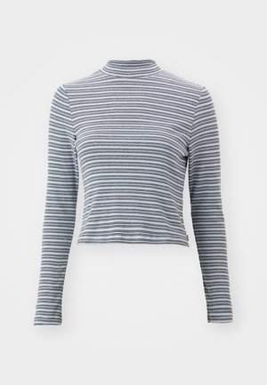 Striped long-sleeve turtleneck top, made of soft fabric. Features narrow horizontal black and white stripes and a fitted design.