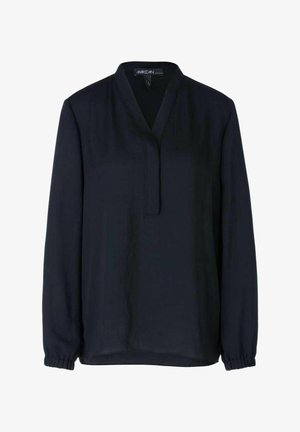 Blouse bleu marine en tissu lisse, dotée d'un décolleté en V, de manches longues avec des poignets élastiques, et d'une coupe décontractée. Design simple et minimaliste.