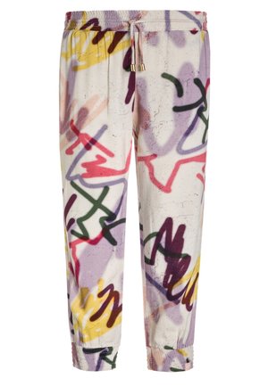 Pantalons de jogging blancs avec des motifs abstraits de graffiti multicolores en rouge, violet, jaune, vert et noir, dotés d'une taille élastique et de poignets.