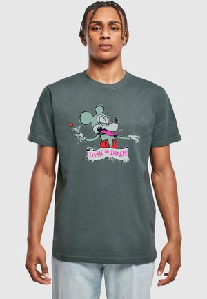Dark green cotton t-shirt featuring a cartoon mouse holding a cocktail, with text "Livin' the Dream" in pink beneath the graphic.