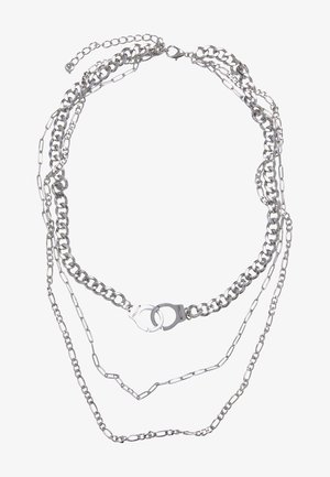 Collana a catena multistrato in argento con diverse stili di catena, tra cui anelli e un particolare dettaglio con chiusura a manetta.