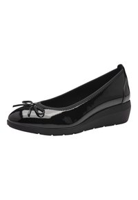 Escarpins compensés en cuir verni noir avec un bout arrondi et un nœud sur le devant. Fini lisse avec une semelle texturée.