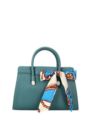 Sac à main structuré couleur sarcelle avec anses arrondies, orné d'un foulard en soie blanc et bleu noué aux motifs de chaînes et de cordes.