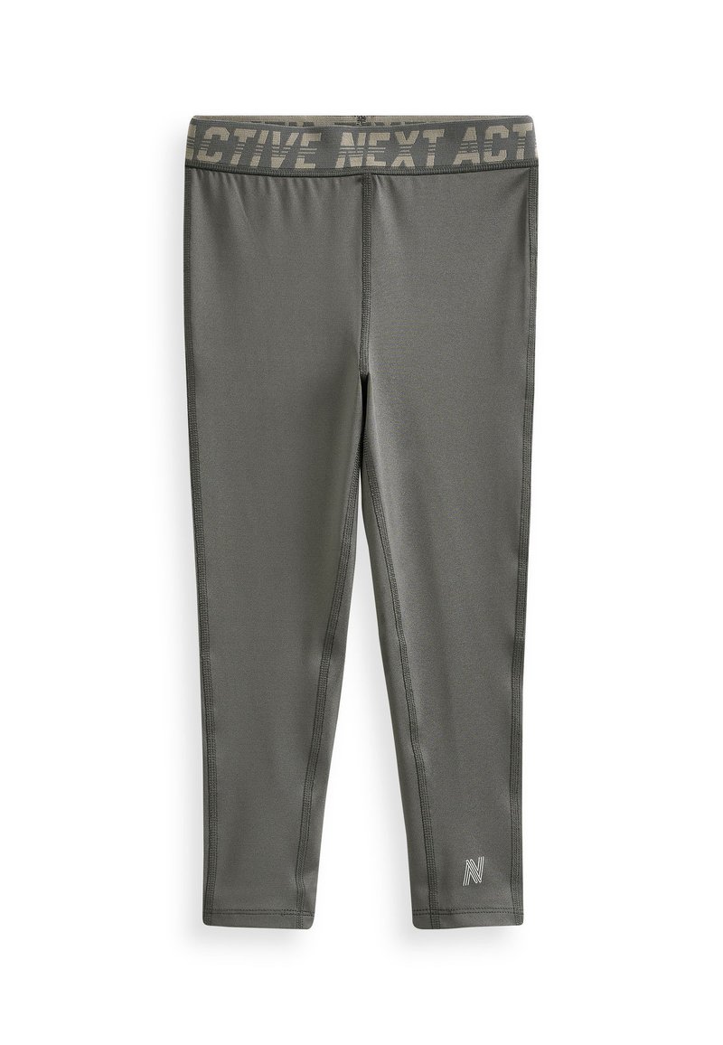 Grå aktive leggings med en bred talje, der har teksten "ACTIVE NEXT ACT". Lavet af strækbart materiale med flade sømme og logodetalje.