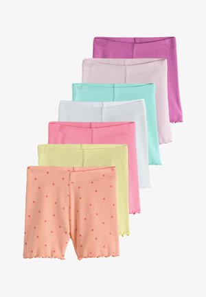Șapte perechi de pantaloni scurți cu nervuri pentru copii mici în culori pastel: piersică cu puncte, galben, roz, alb, mentă, roz deschis și mov, stivuite vertical.