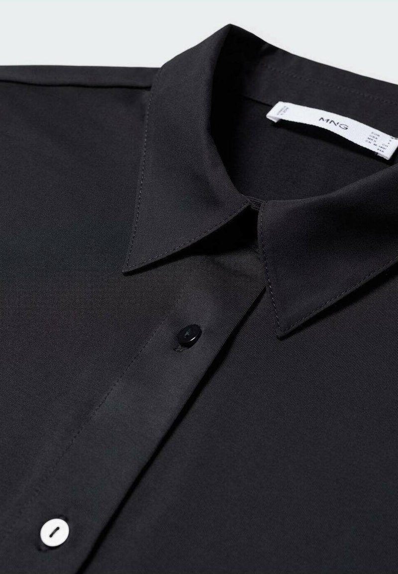 Mango Button-down blouse - black - (Pre-owned) - Zalando.ie