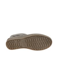 Bruine rubberen buitenzool met een getextureerd grippatroon; voorzien van "Gabor" merknaam. Geeft duurzaamheid en grip aan schoeisel aan.