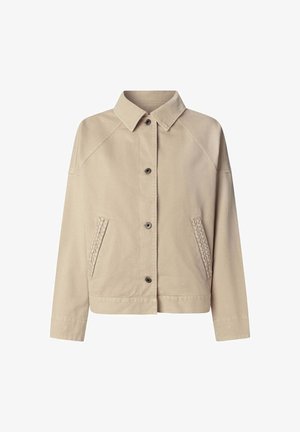 Beige puuvillane jakk, millel on koht, ees nupplesulgemine, dekoratiivsed punutud taskuaktsendid ja raglansleeved.