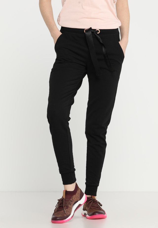 SKINNY - Spodnie treningowe - black