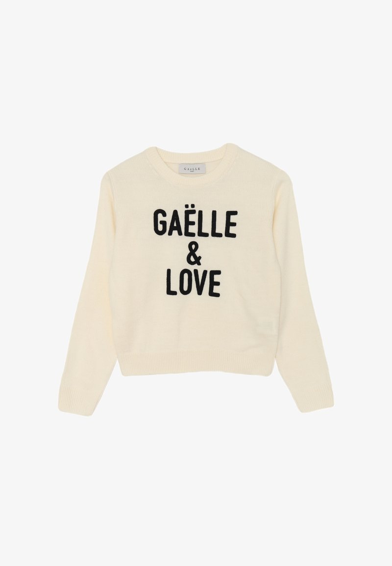 Maglione crema con scollo a girocollo, caratterizzato da scritte nere "GAËLLE & LOVE" ben in evidenza sulla parte anteriore. Morbida texture a maglia.