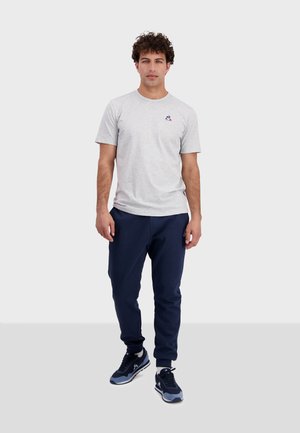 ESSENTIELS - Pantalon de survêtement - bleu