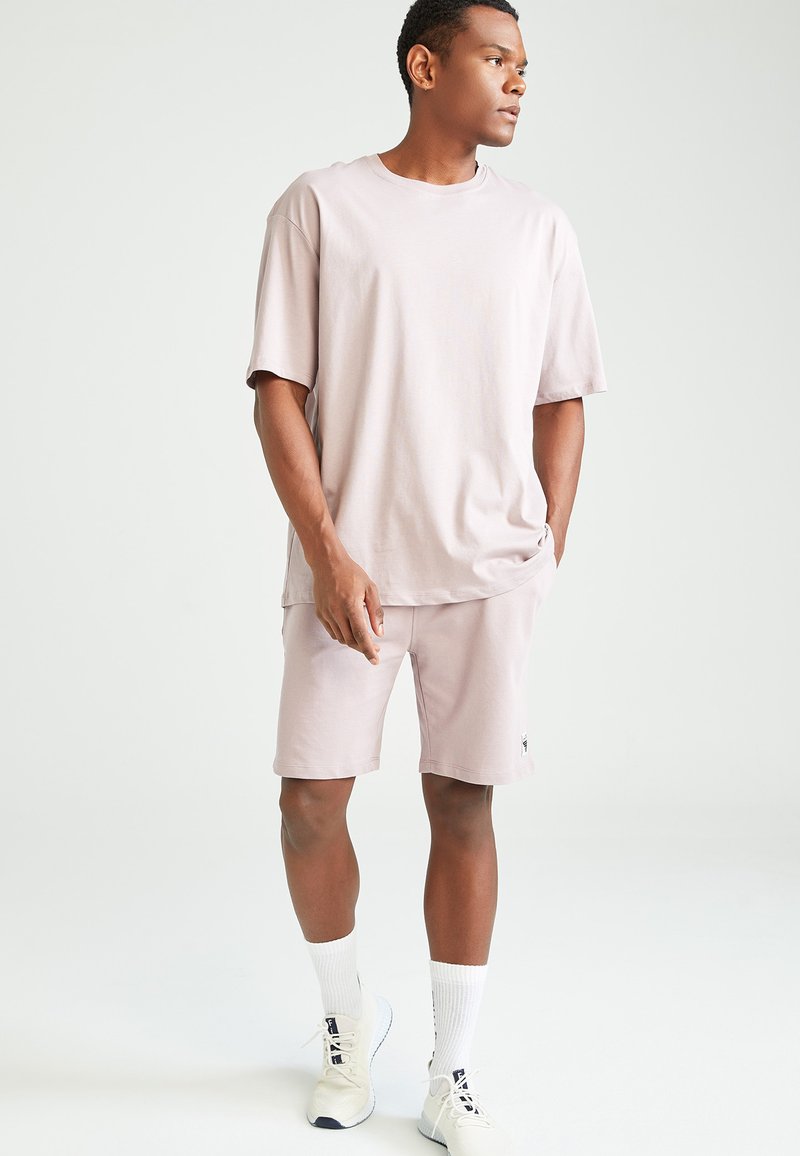Herren Trainingsanzüge | DeFacto Jogginghose pink/rosa - XZ24409 Herren Trainingsanzüge | DeFacto Jogginghose pink/rosa - XZ24409