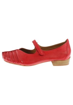 Red leather Mary Jane shoe with a round toe, pleated front design, adjustable strap, and a low wooden heel. Smooth texture throughout.