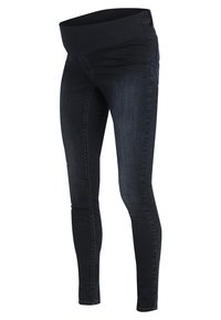 Zwarte skinny jeans met een brede elastische tailleband, voorzien van een soepele denim textuur en minimale stikdetails. Ontworpen voor comfort en flexibiliteit.