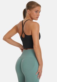 SQUATPROOF REPOSE ACTIVE  - Top - black