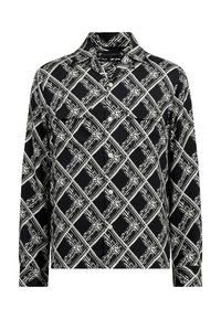 Camicia a maniche lunghe bianca e nera con bottoni, caratterizzata da un motivo geometrico a quadri e un colletto, realizzata in tessuto morbido.