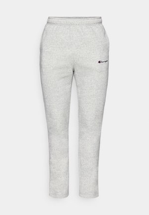 Sive cotton trenirke s elastičnim pojasom, sužene nogavice i malim izvezenim logom s crvenim i plavim naglascima.