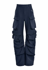 Navy cargo pants with multiple large side pockets, a relaxed fit, and gathered fabric details at the sides. Made from a lightweight material.