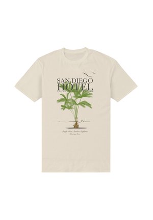 T-shirt beige avec une illustration de palmier vert et le texte « San Diego Hotel » et « Pacific Coast, Southern California ».