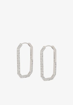 Boucles d'oreilles en métal argenté en forme d'octogone, entourées de petites cristaux transparents, avec un fermoir à charnière pour un maintien sécurisé.