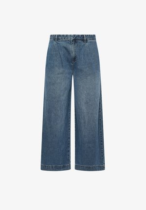 Denim culottes in a medium blue wash, featuring a wide leg design, high waist, and subtle fading. Stitched hem and front pockets.