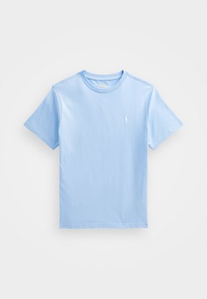 T-shirt en coton bleu clair à manches courtes, col rond et petit logo blanc brodé sur la poitrine gauche.