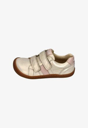 Child's beige leather sneaker with two Velcro straps, pink accents, and a brown rubber sole, viewed from the side.