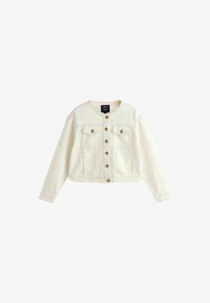 Kermanvärinen, lyhyt farkkutakki, jossa pitkät hihat, nappikiinnitys edessä ja kaksi nappilistallista rintataskua.