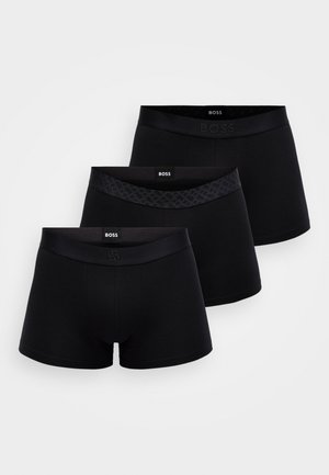 Trei perechi de boxeri negri, fiecare având un design diferit al brâului: unul cu un brâu neted, altul cu un brâu cu model și detalii cu logo.