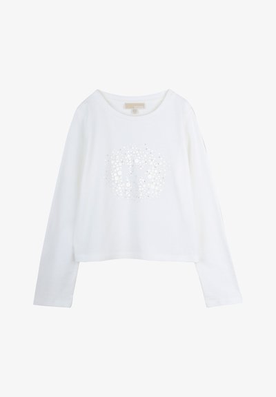 Άσπρο μακρυμάνικο πουκάμισο με κυκλικό σχέδιο από μικρές ασημένιες κουκίδες και λογότυπο "MK" στο κέντρο. Απαλό βαμβακερό ύφασμα. Κοντό κομμένο σχέδιο.