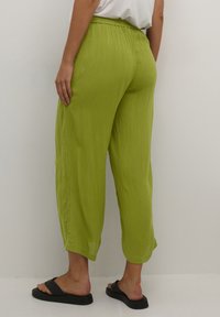 Kaffe DACIA AMBER - Trousers - calla green