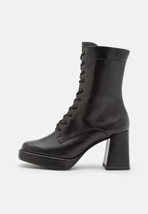 Bottines à talons hauts - black