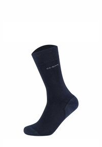 Calcetín de algodón azul marino con una textura suave, puntera y talón reforzados, puño acanalado y texto impreso "CA-SOFT" en el lateral.