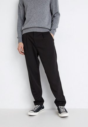 Spodnie materiałowe