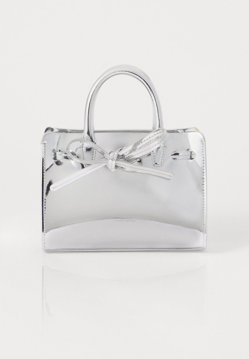 Silver metallic handbag with a sleek rectangular shape, featuring a tied bow detail on the front and dual short handles. Smooth texture.