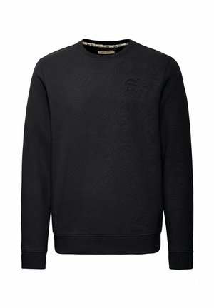 Sudadera negra de tejido texturizado con cuello redondo, puños acanalados y un sutil logo de montaña bordado en el pecho.