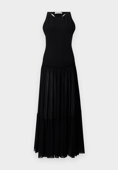 Črna obleka z brezrokavnim vrhom in izrezanimi detajli, tiered krilo iz lahkega, tekočega materiala.