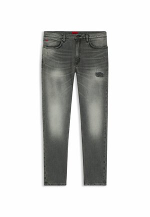 Slim-fit grey jeans with faded areas and a small distressed patch on the right thigh, featuring front pockets and belt loops.
